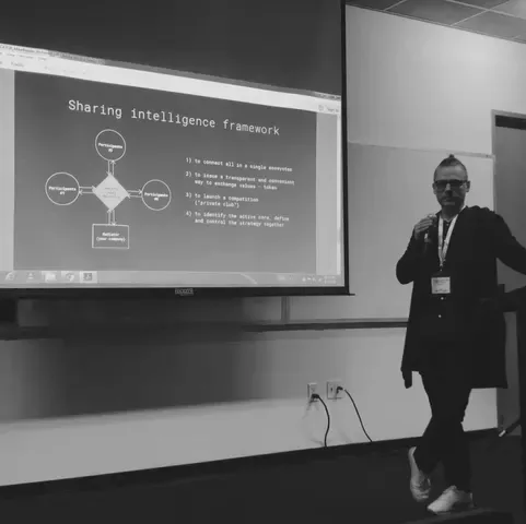 Mike Brusov presenting the sharing intelligence framework